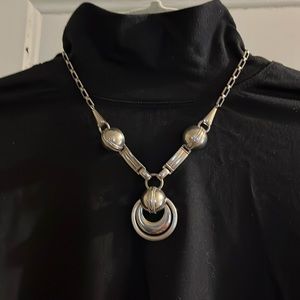 Unique silver tone necklace